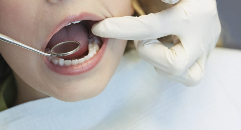 child having dental exam
