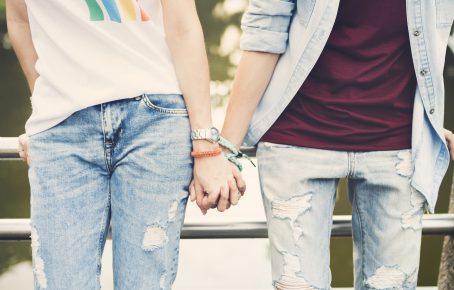 youth couple holding hands