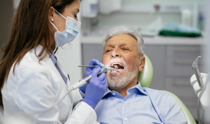 Senior man at the dentist