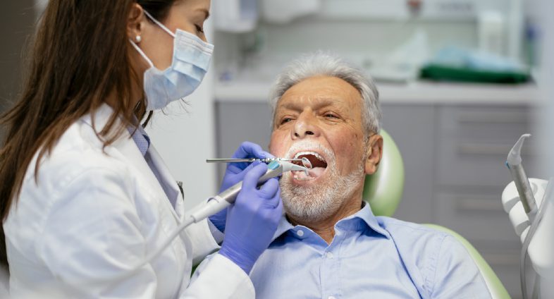 Senior man at the dentist